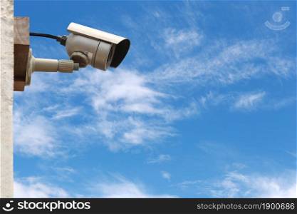 CCTV camera system on blue sky background with copy space.