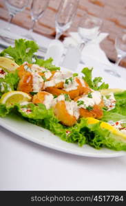 Ceasar salad served in the plate