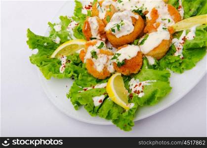 Ceasar salad served in the plate