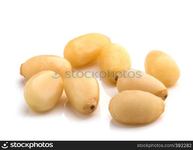 Cedar Pine nuts on a white background