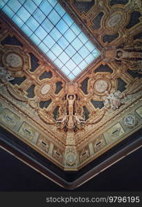 Ceiling architectural details of the Salon Carre inside Louvre museum, Paris, France
