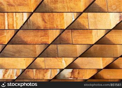 Ceiling background of square wooden timbers painted in brown colors. Ceiling background of wooden timbers painted in brown colors