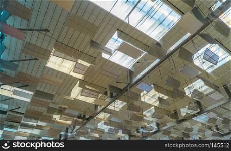 Ceiling design decoration. Industrial background of grille ceiling and light bulbs