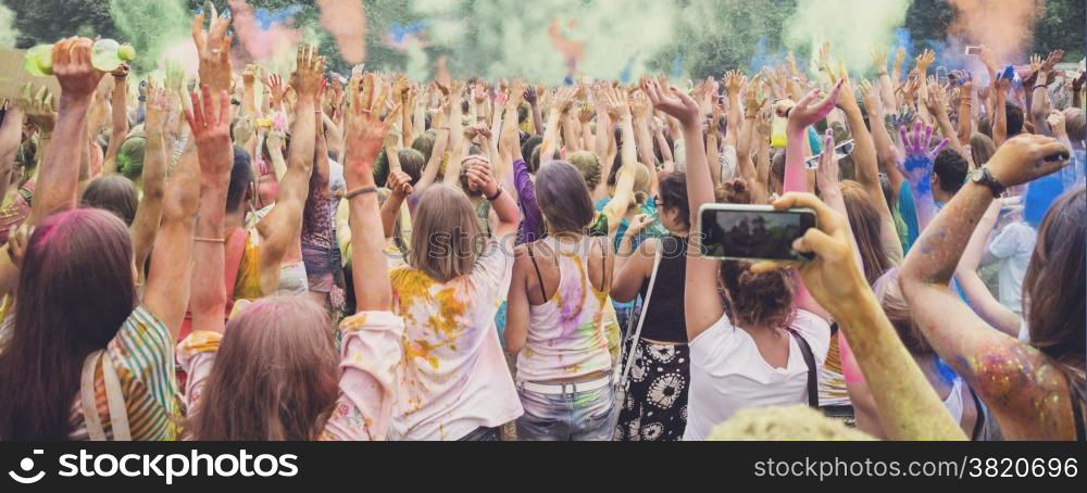 Celebrants dancing during the color Holi Festival