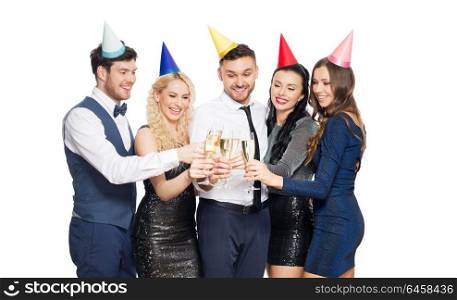 celebration and holidays concept - happy friends clinking champagne glasses at birthday party. friends with champagne glasses at birthday party