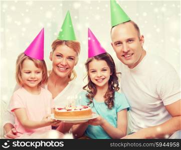 celebration, family, holidays and people concept - happy family with two kids in party hats at home