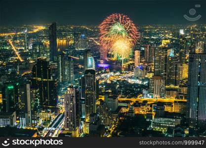 celebration fireworks and over lighting Christmas in holiday at night time in the business city Bangkok Thailand photo shoot mahanakorn sky wolk new location and landmark good view