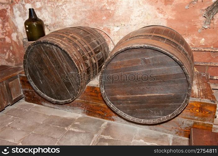 Cellar with casks. An old basement with wine casks