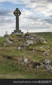 Celtic cross concept religion landscape in Ynys Llanddwyn Island in Anglesey Wales
