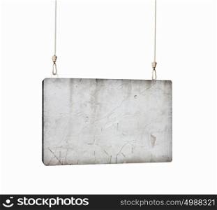 Cement banner. Image of cement blank banner hanging on ropes