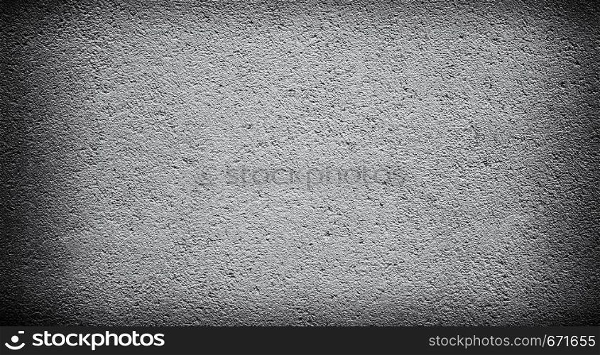 Cement or concrete wall background with darkened edges. Deep focus. Mock up or template. Dark corners. Cement or concrete wall background