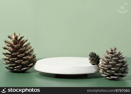 cement pedestal concrete podium with pine cones. display showcase for natural self care product or forest grown food.. cement pedestal concrete podium with pine cones. display showcase for natural self care product or forest grown food