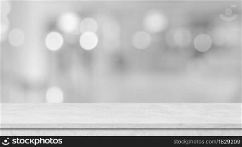 Cement white table top perspective, counter, desk over blur bokeh light background, for product display, mockup, montage, template.