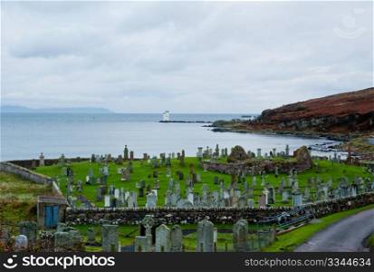 Cemetery and Port Ellen lighthouse on the isle of Islay