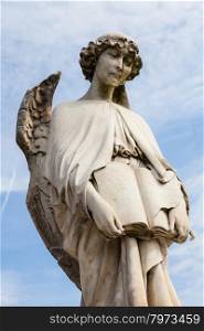 Cemetery statue in Italy, made of stone - more than 100 years old