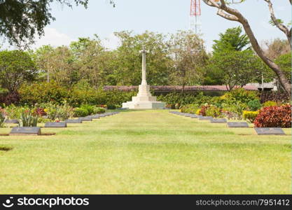 Cemetery with crosses in the cemetery And tombstones in the grass.