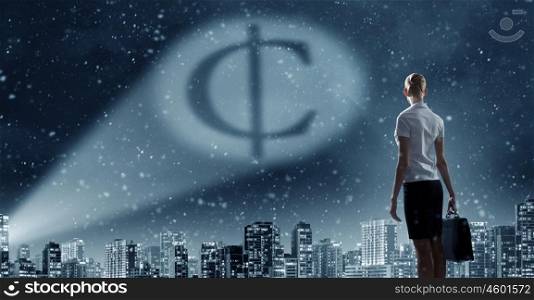 Cent symbol in dark sky. Businesswoman standing with back and cent sign in spotlight