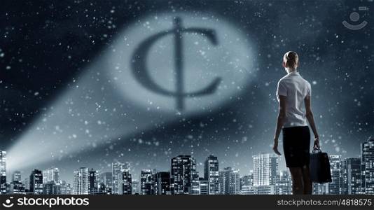 Cent symbol in dark sky. Businesswoman standing with back and cent sign in spotlight