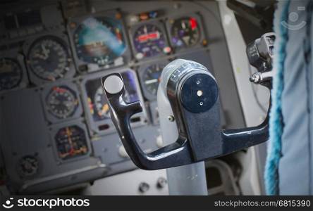 Center console and throttles in an old airplane