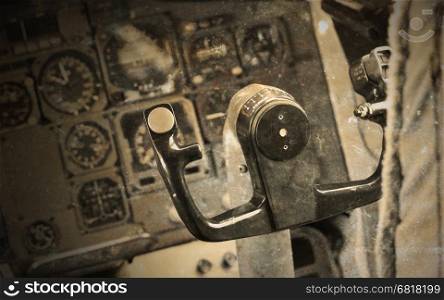 Center console and throttles in an old airplane