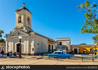 Center square of Cuban town with church Iglesia San Francisco de Paula, Trinidad, Cuba
