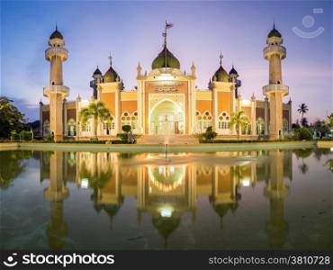 Central mosque with reflection at dusk, Pattani, Thailand