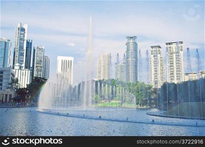 Central park in Kuala Lumpur, fountains in front of Petronas Twin Towers