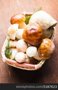 Ceps in the basket prepared for cooking on the table