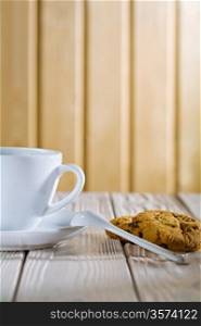 ceramic coffee cup and cookies