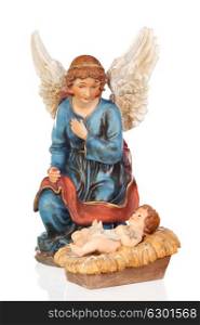 Ceramic figure of The Baby Jesus and the angel of the nativity scene isolated on a white background
