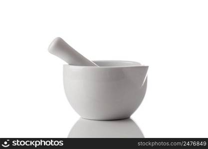 Ceramic mortar and pestle isolated on a white background