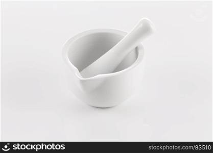 Ceramic mortar and pestle on a white background