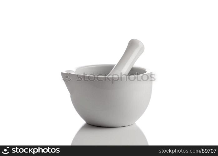 Ceramic mortar and pestle on a white background