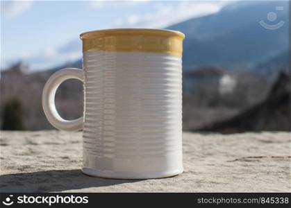 Ceramic tea mug closeup on stone surface closeup