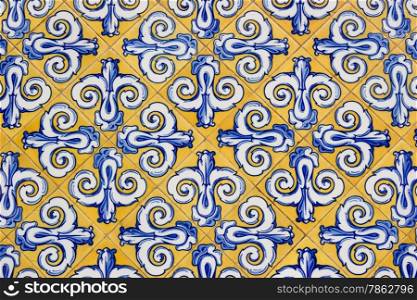 Ceramic tile decorated by hand with a texture from the floral pattern
