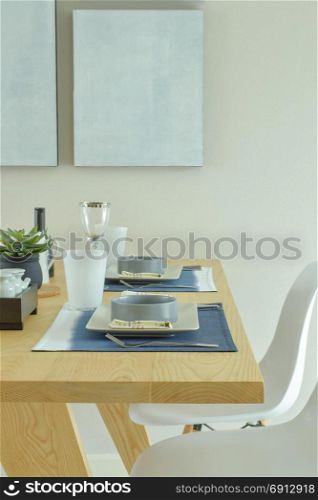 Ceramic ware dining set on wooden dining table