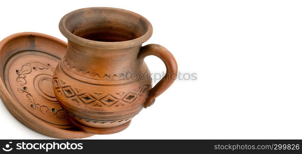 Ceramics cup and saucer isolated on white background. Wide photo. Free space for text.