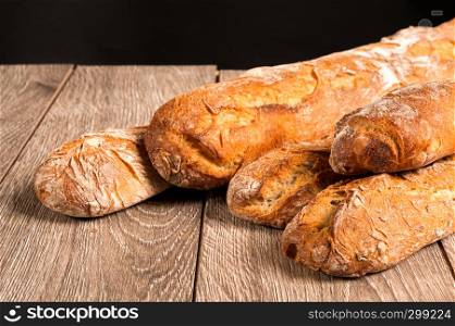 cereal baguette on the table on dark background