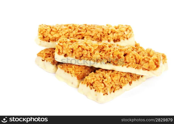 Cereal bars with white chocolate isolated on white background.