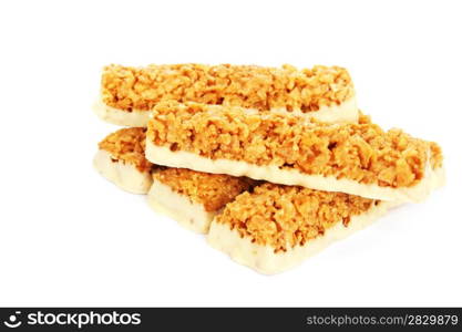 Cereal bars with white chocolate isolated on white background.