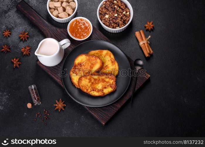 Cereal with chocolate, milk and bread in an egg against a dark concrete background. Delicious nourishing breakfast. Cereal with chocolate, milk and bread in an egg against a dark concrete background