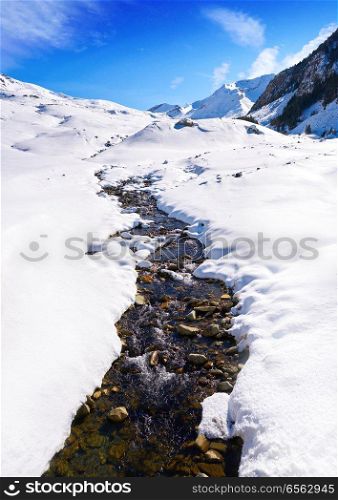 Cerler snow stream in Pyrenees of Huesca in Spain
