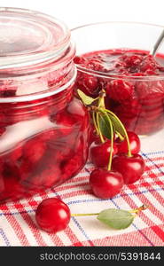 Cerry jam with fresh fruits isolated on white