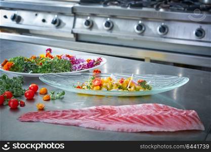 Ceviche dish preparation in kitchen of restaurant