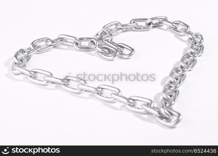 Chain combined in the form of heart. Strong love