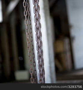 Chains hanging on a wall