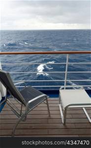 Chair and a stool on the deck of cruise ship Silver Shadow, East China Sea