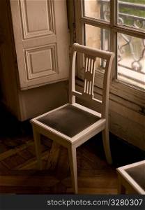 Chair in front of window