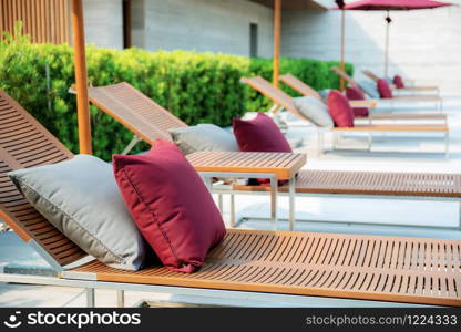 Chair of lifestyle on swimming pool in resort.