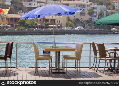 Chairs and tables in a restaurant at the seaside, Ephesus, Turkey